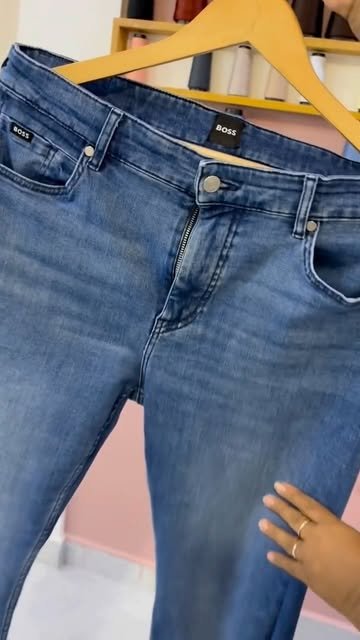 Calça jeans com ajuste de cós e lateral